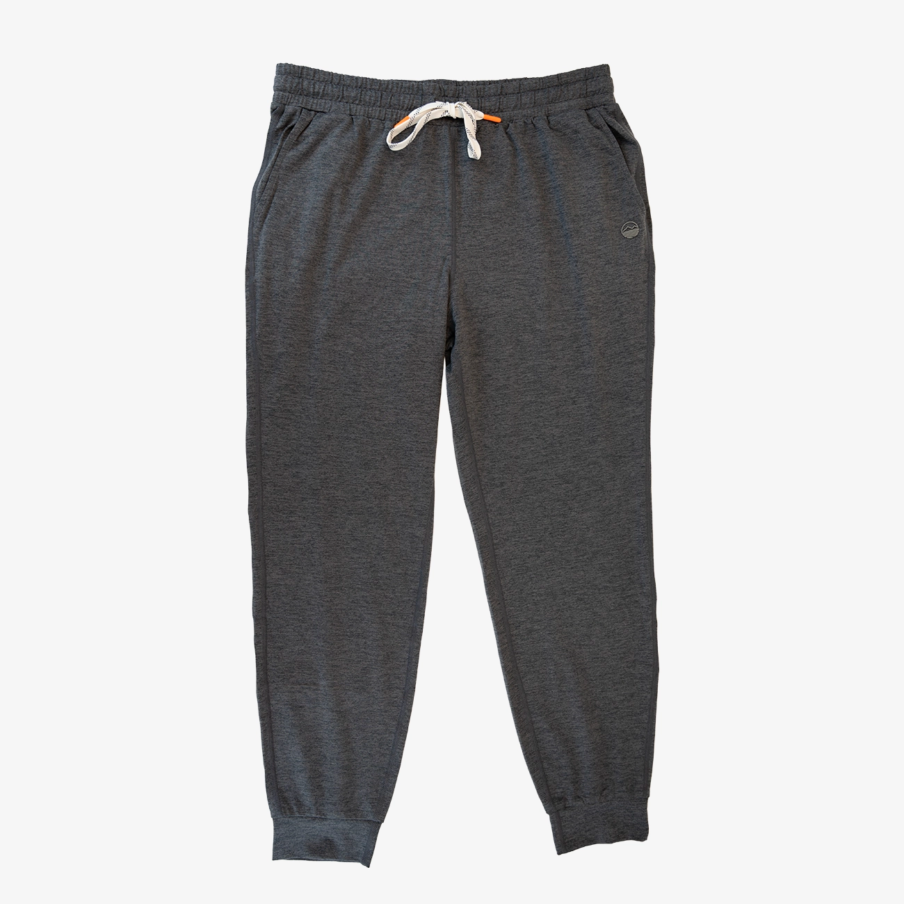 Dark heather gray jogger pants with an elastic waistband, white drawstring, and a small embroidered logo on the left hip, shown against a plain white background.