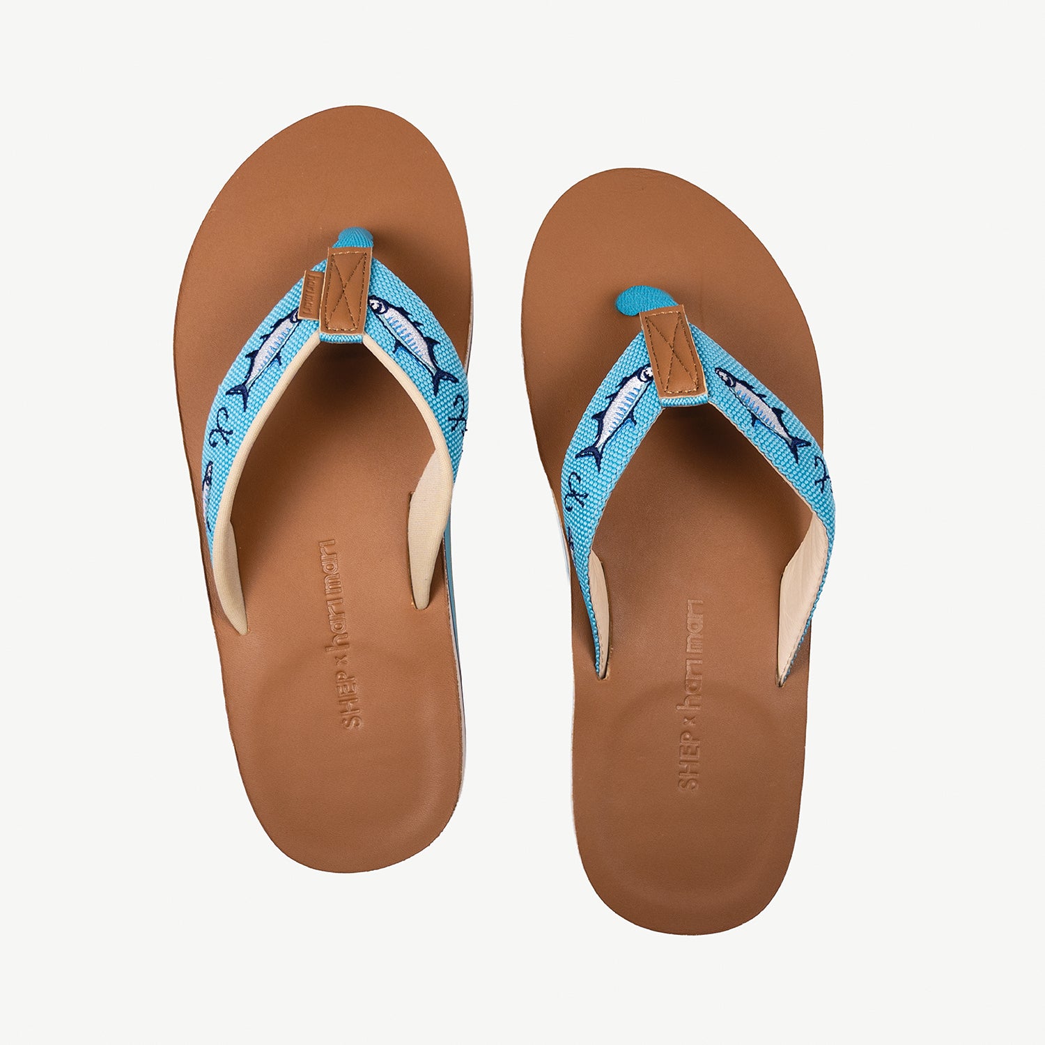 blue Shep x Hari Mari men's leather flip flops with fish and fish hooks