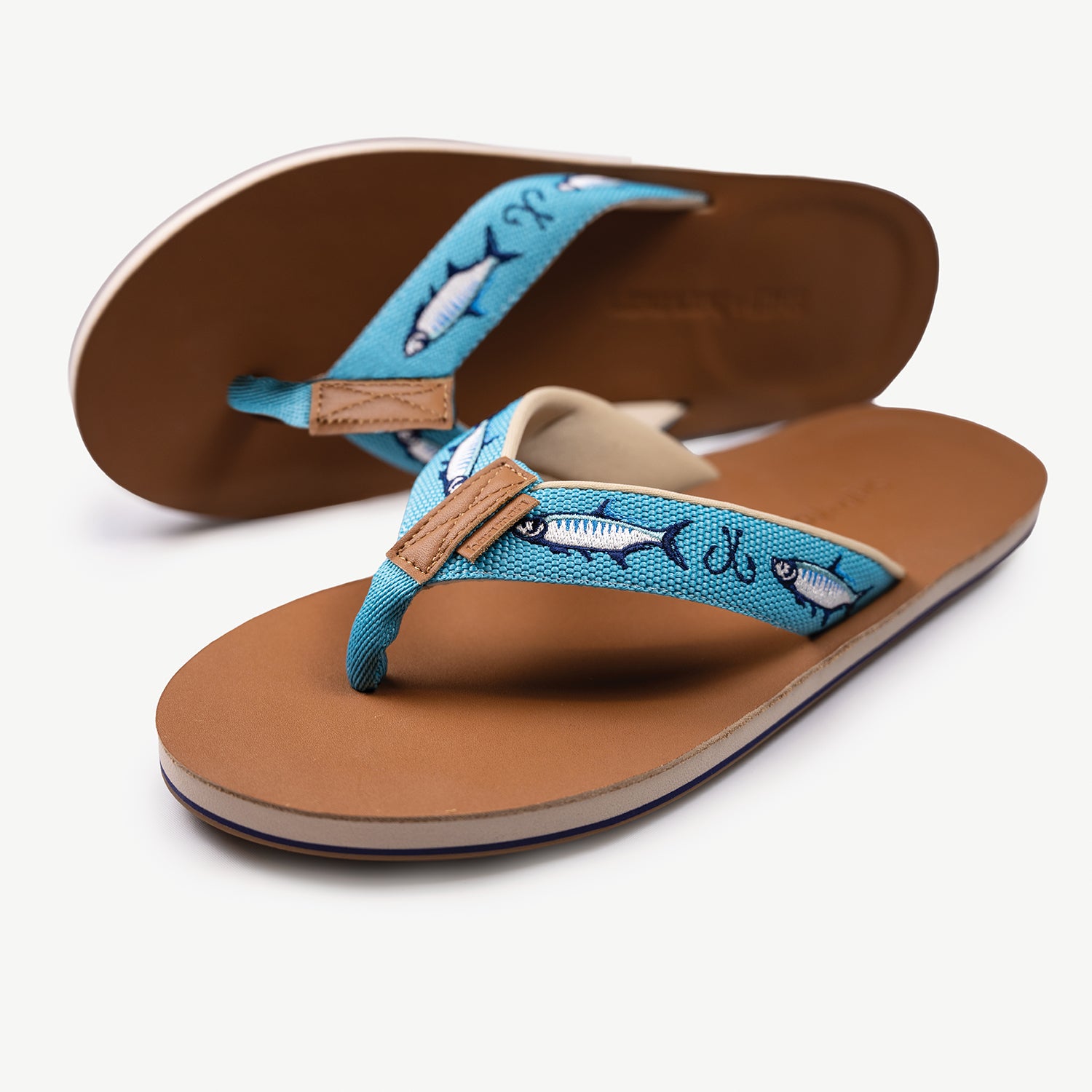 blue Shep x Hari Mari men's leather flip flops with fish and fish hooks