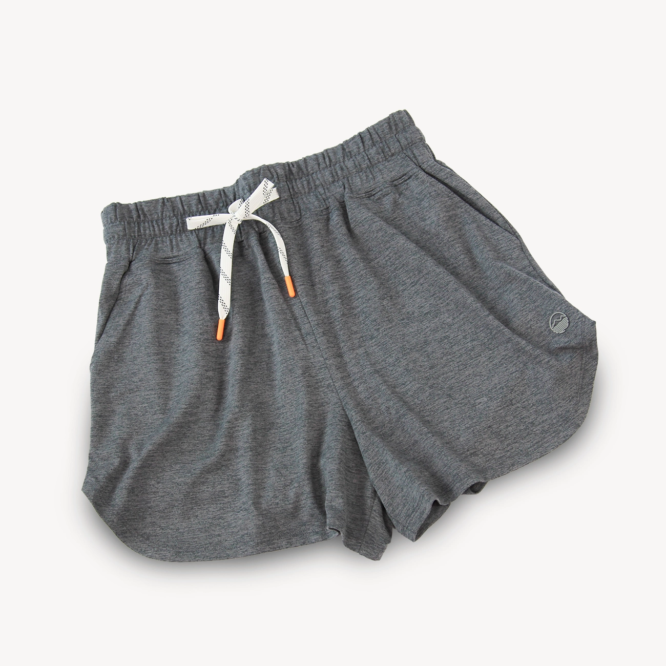 A pair of women's heather gray athletic shorts from Hari Mari with an elastic waistband, white drawstring, and orange tip accents, displayed on a light off-white background.