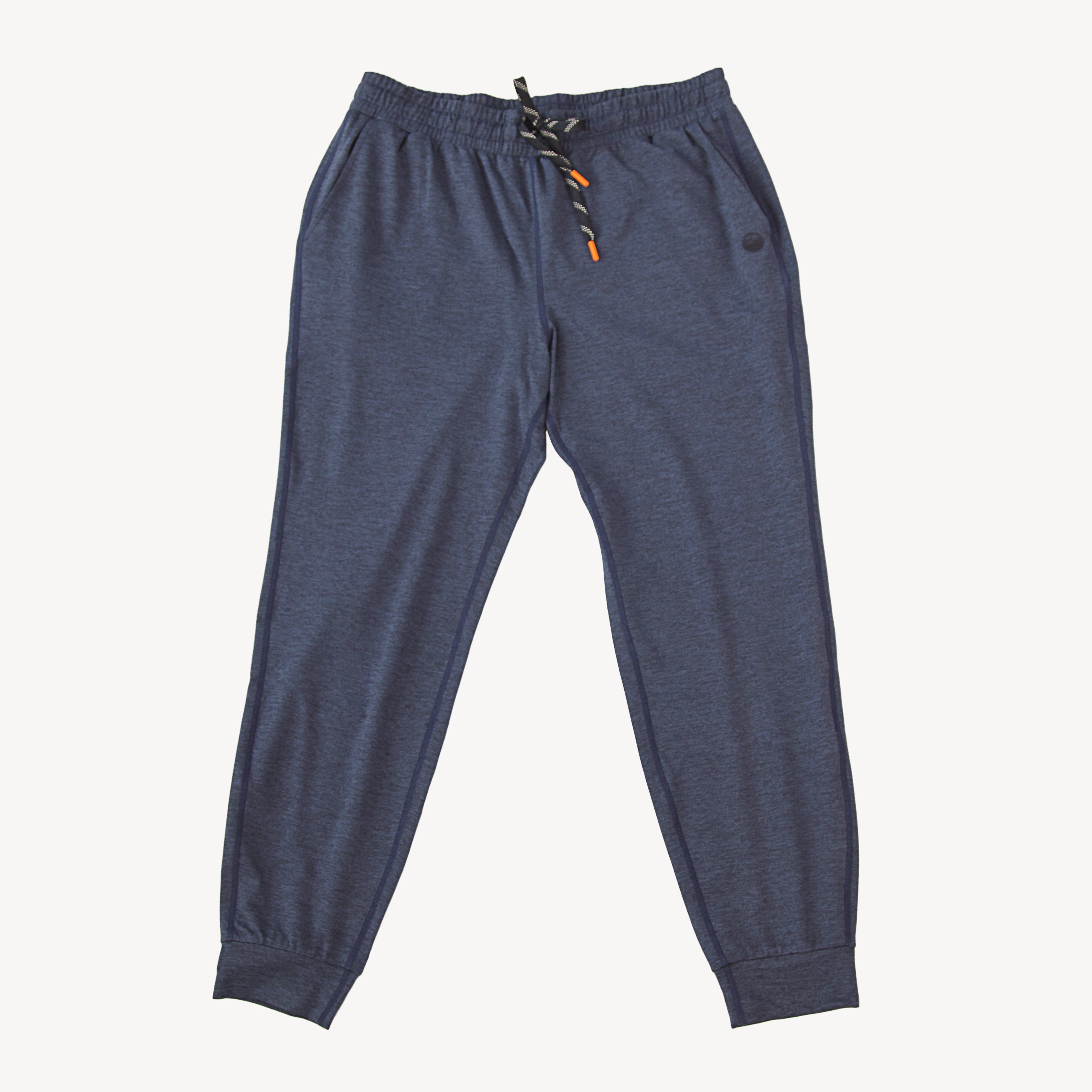 A pair of navy blue Hari Mari heathered joggers with an elastic waistband, black and orange patterned drawstring, and ribbed ankle cuffs, shown flat on a light off-white background.