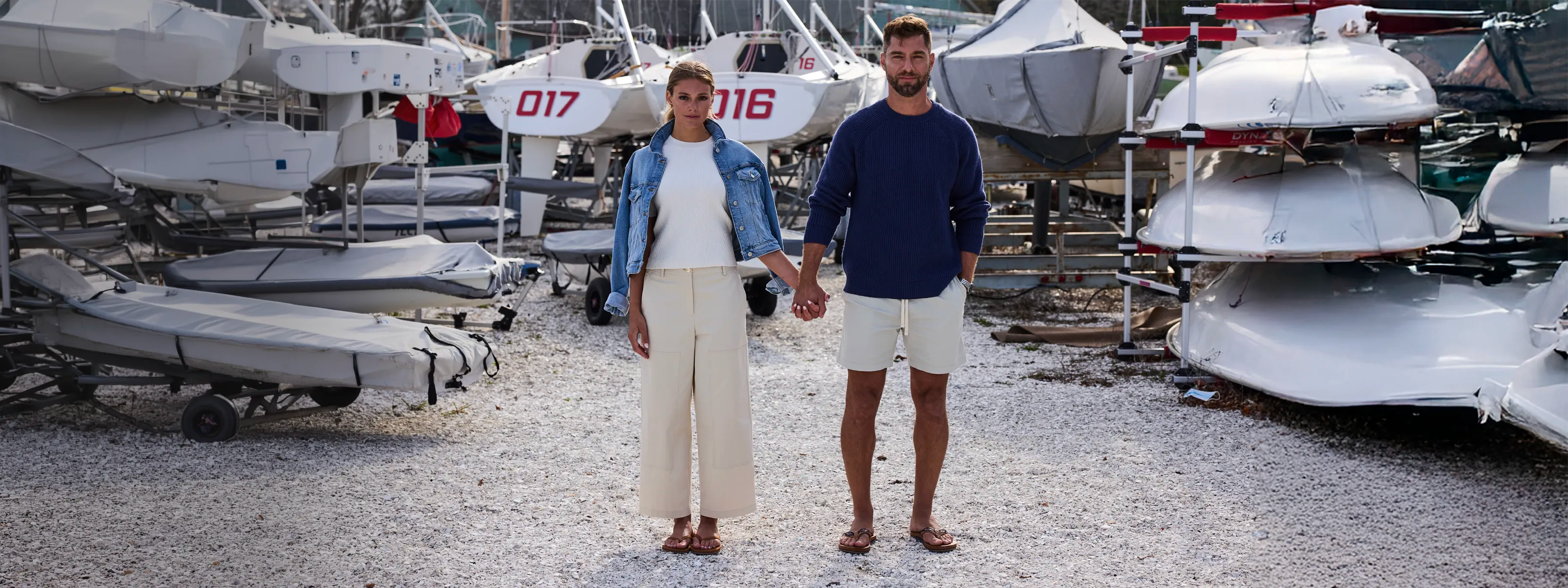 man and woman standing in front of boats  in Newport, RI, wearing Hari Mari flip flops