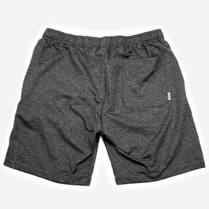 back of charcoal Hari Mari shorts on white background showing pocket