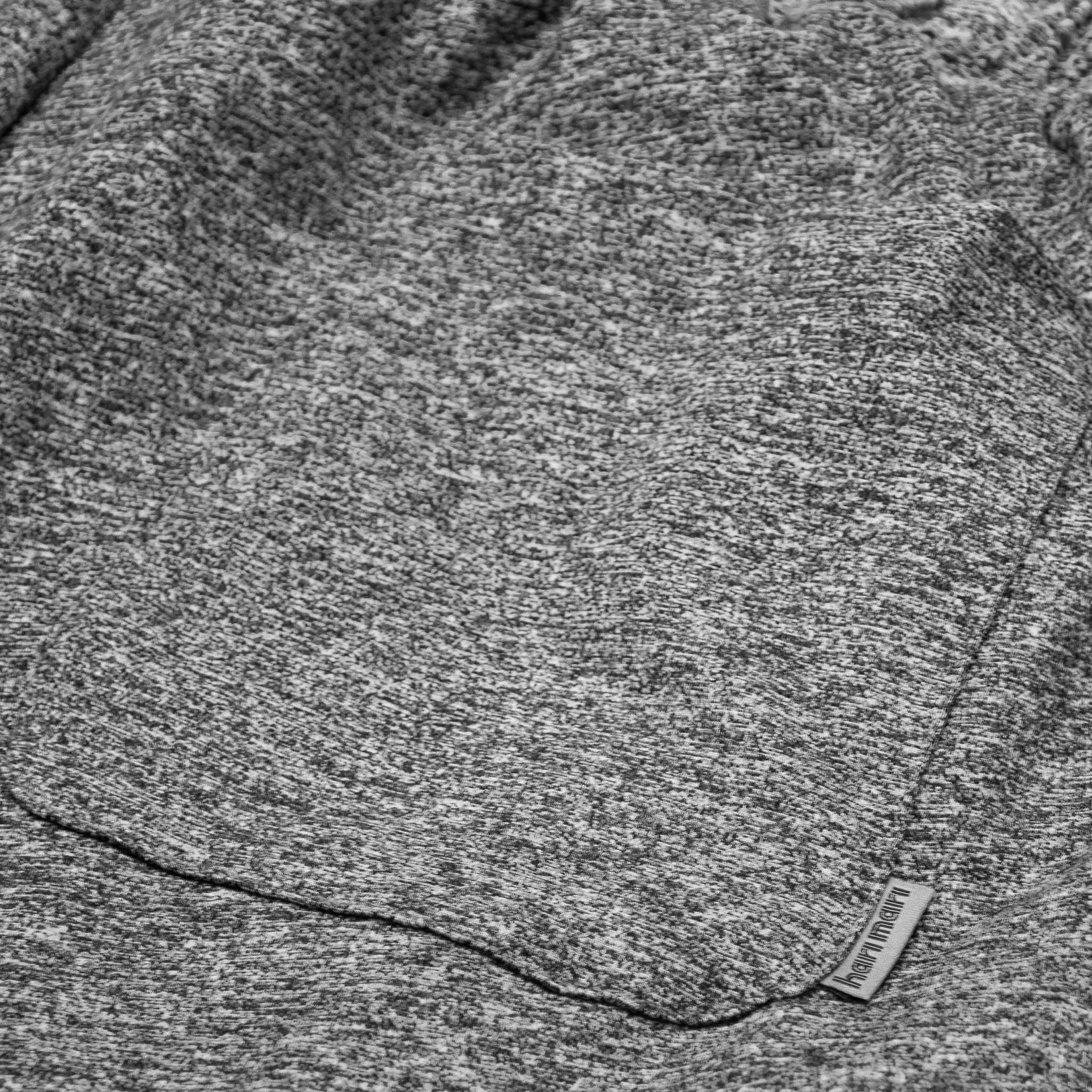 Back pocket of men's gray shorts from Hari Mari