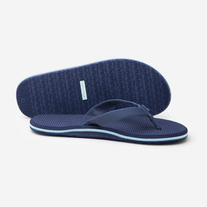 photo of navy blue flip flops 