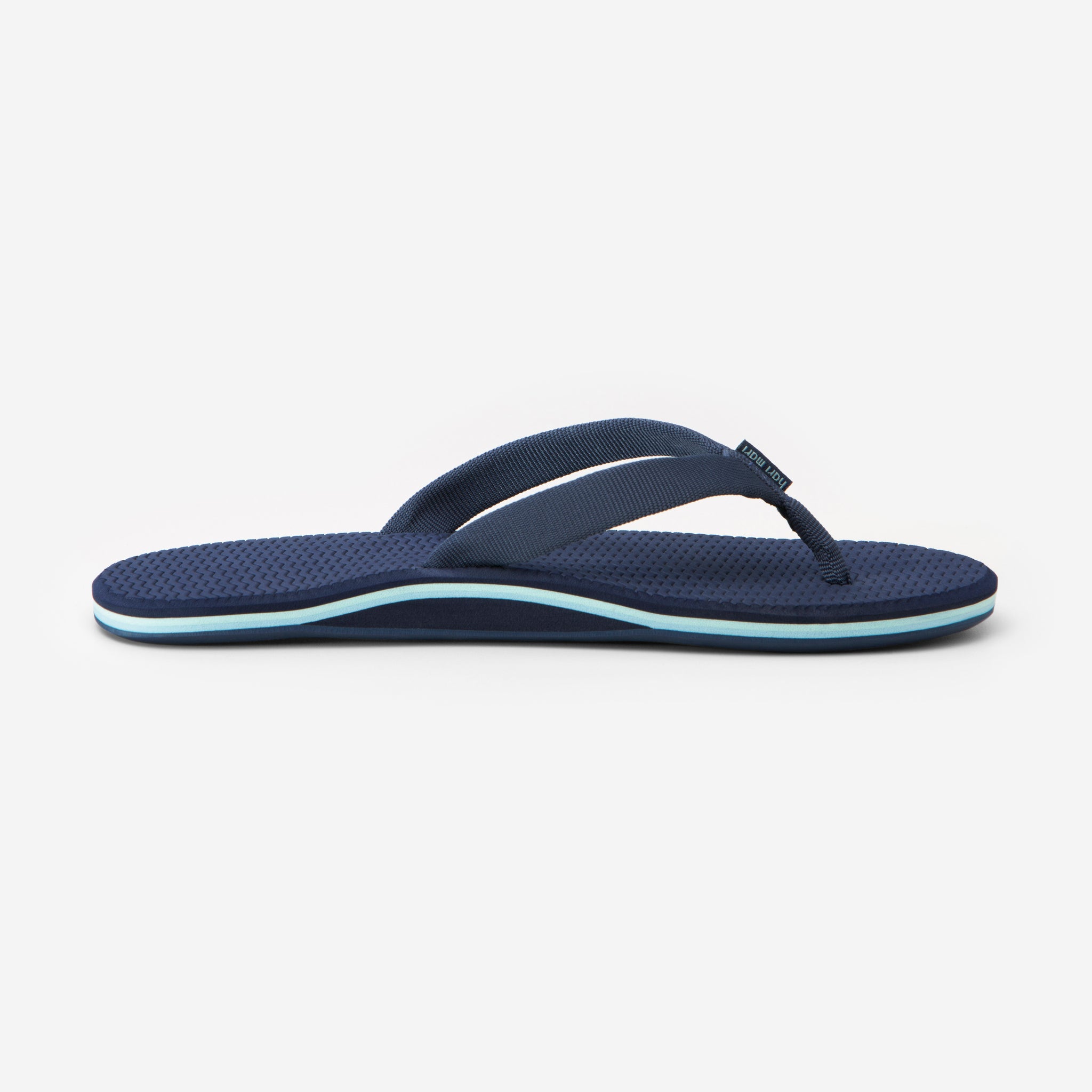 photo of navy blue flip flops 