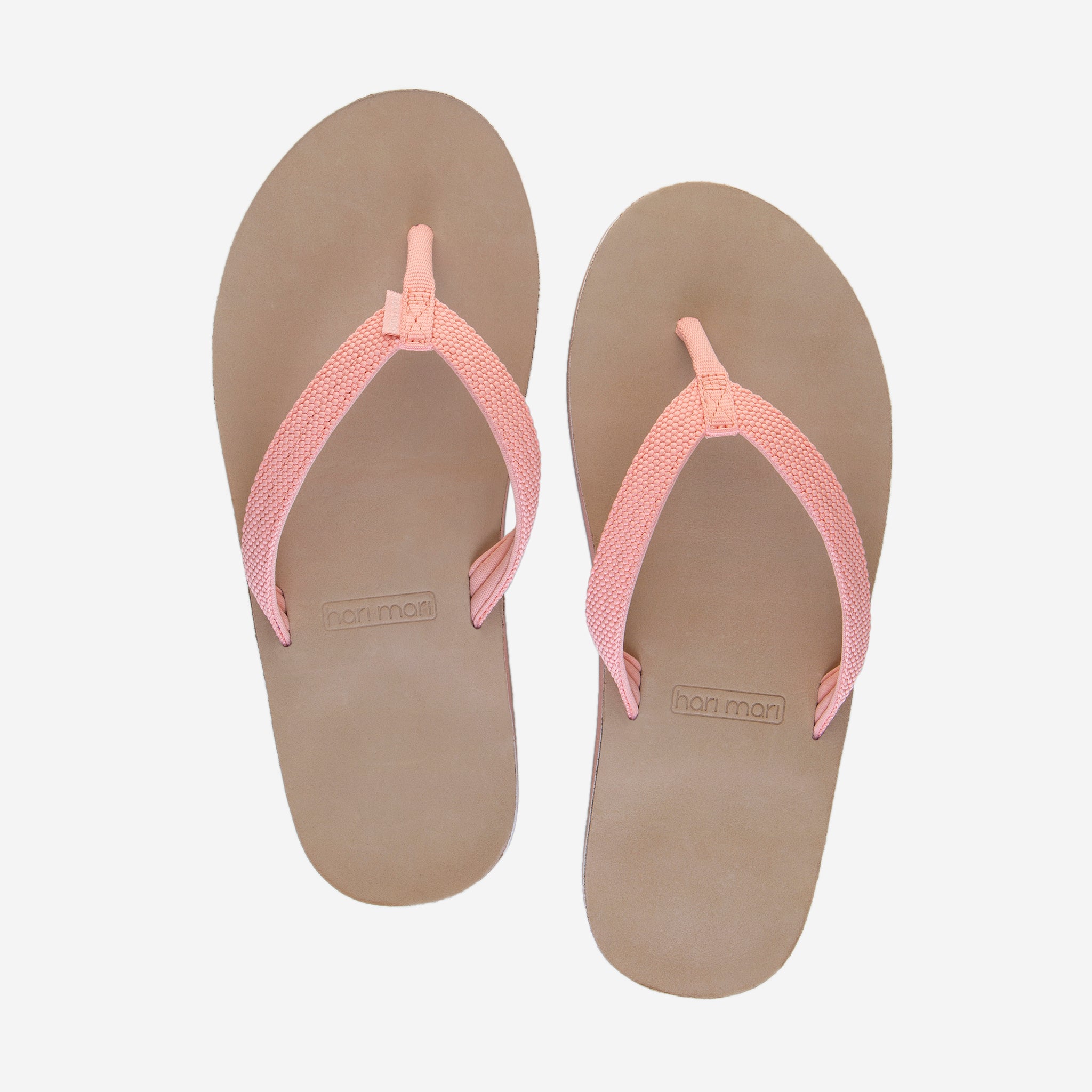 Hari Mari Women's scouts flip flops in coral pink/sand on white background