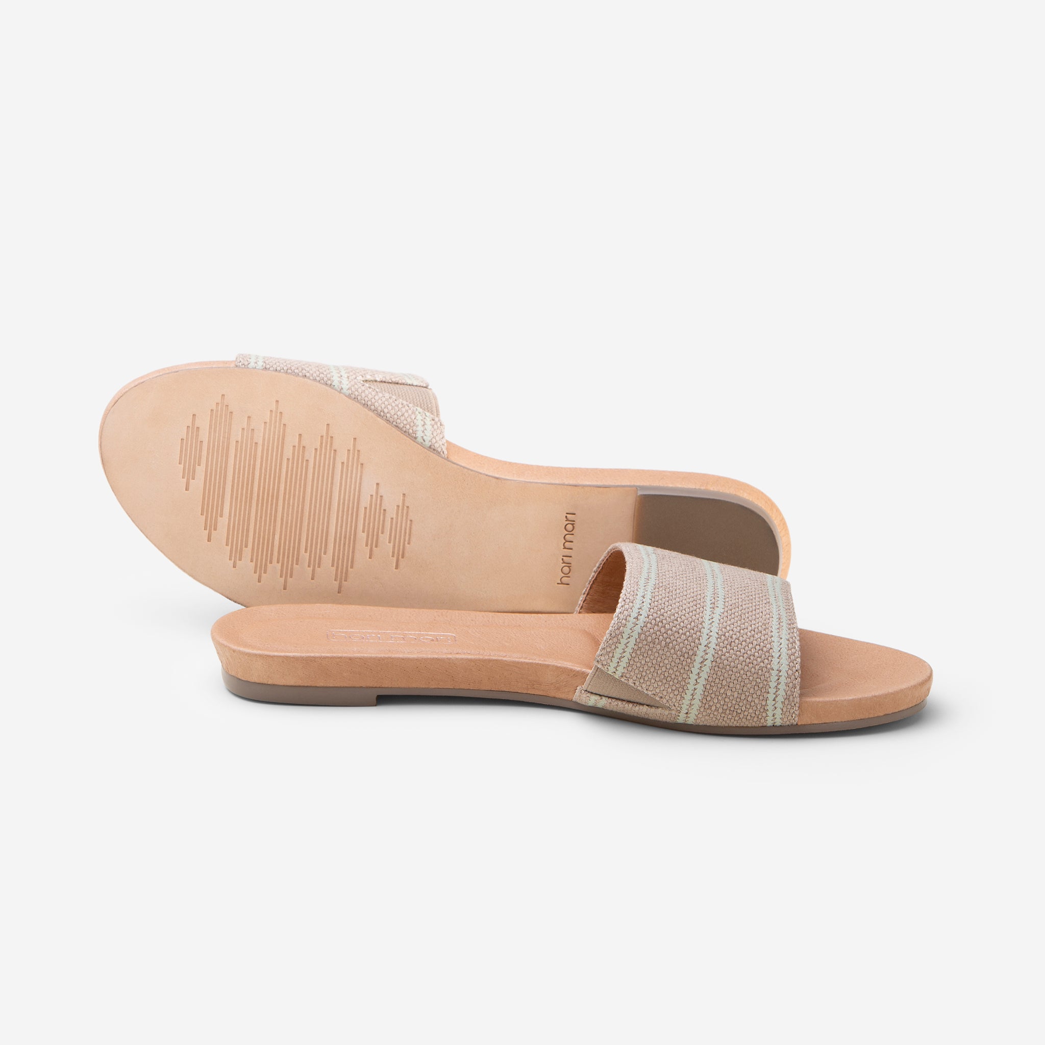 Hari Mari Sydney Woven Sandal in Natural on white background showing sandal and bottom of sandal genuine leather outsole