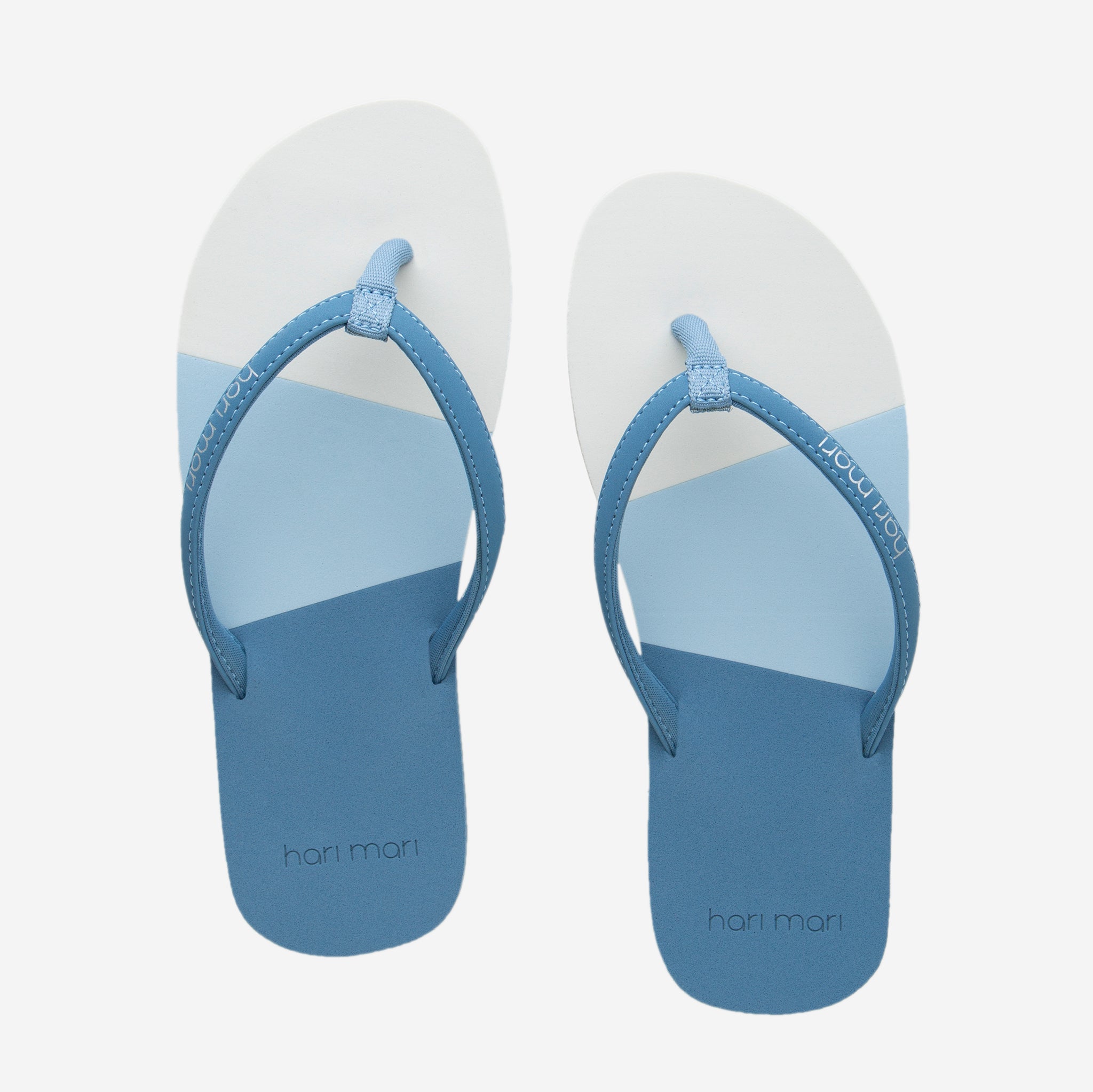 Hari Mari Youth Meadows Asana Flip Flops in Dusty Blue with multi colors on white background