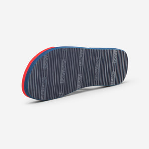 Hari Mari Meadows Asana Youth Flip Flops in red white and navy showing bottom of shoe rubber outsole on white background