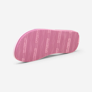 Hari Mari Meadows Asana Youth flip flops in Rose/multi color showing bottom of shoe rubber outsole on white background